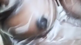 Indian Aunty With Big Nipples In A Steamy Video